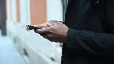 Handsome African American man using smartphone. Stock Footage 126527482