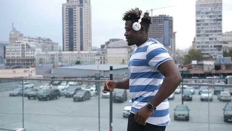Handsome afro american man dancing in city street Stock Footage 96060872