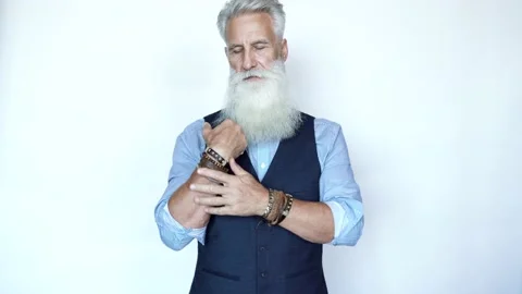 Handsome aged male model posing on white background Stock Footage 233655164