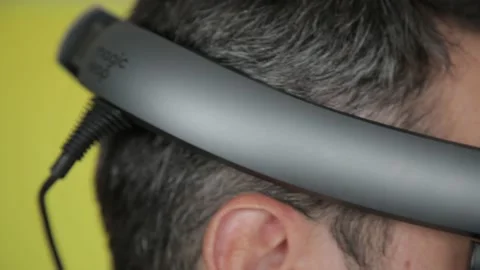 Handsome american man wearing virtual reality headset. Augmented Reality. Man Stockbeeldmateriaal 142880215