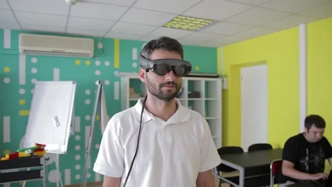 Handsome american man wearing virtual reality headset. Augmented Reality. Man 動画素材 142882812