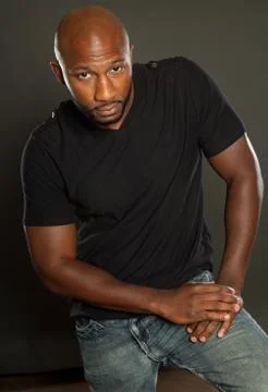 Handsome, athletic  man casually posing Stock Photos