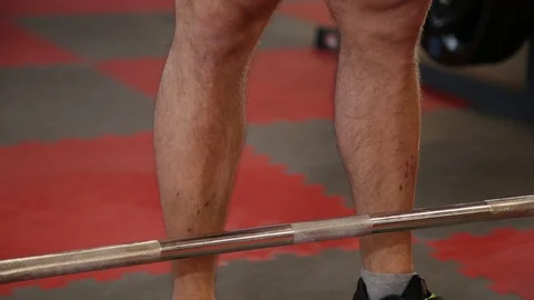 Handsome athletic man performs deadlift in the gym 스톡 동영상 102440041