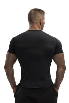 Handsome athletic man posing in T-shirt on a white background Stock Photos