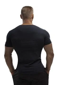 Handsome athletic man posing in T-shirt on a white background Stock Photos