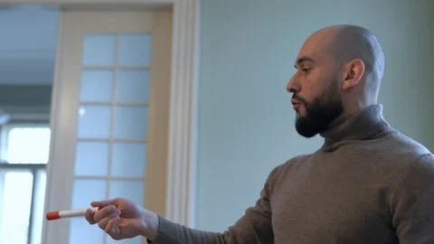 Handsome bald man with beard making speech, 4K 스톡 동영상 124717705