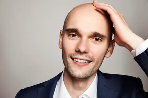 Handsome Bald Smiling Man Stock Photos