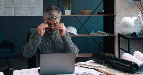 Handsome Bearded Architect working on laptop and Making project on his Computer Stock-Footage 126243716