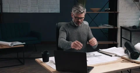 Handsome Bearded Architect working on laptop and Making project on his Computer Stock Footage 145420445