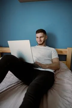 Handsome bearded guy working out at home Foto stock