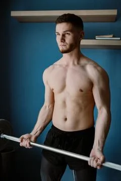 Handsome bearded guy working out at home Foto stock