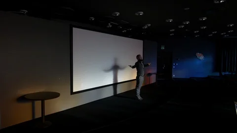 Handsome bearded man bowing to audience after successful conference. this Stock Footage 124929064