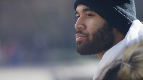 Handsome bearded man in the city looking around in thought Vidéo 103865901