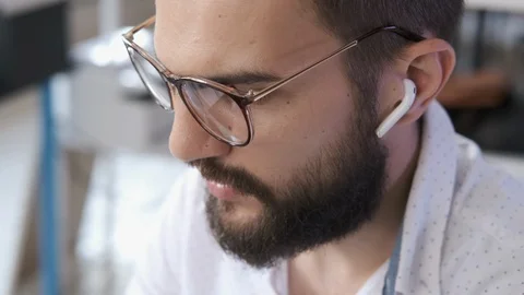 Handsome bearded man is making online video call Video stock 116273416
