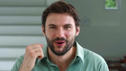 Handsome bearded multi-ethnic man, rejoices from good news or winning lottery Stock Footage 219395668