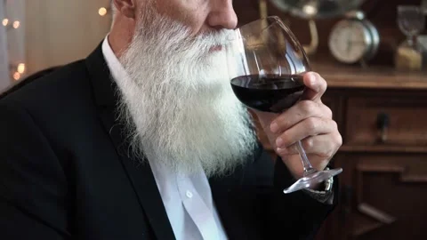 Handsome bearded senior man drinking red wine Stock-Footage 233630707