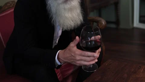Handsome bearded senior man drinking red wine Stock-Footage 233631690