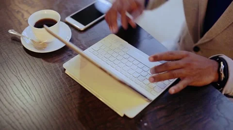 Handsome black man using laptop Stock Footage 56588157