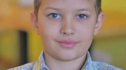 Handsome Boy 8-years looking into the camera Stock Footage 46136612