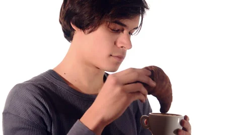 Handsome boy having breakfast Video stock 29978857