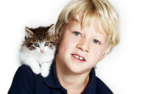 Handsome boy with kitten on shoulder Stock Photos