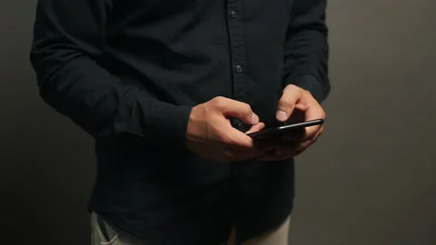 Handsome Business Man Using Smartphone for work Stock Footage 132917080