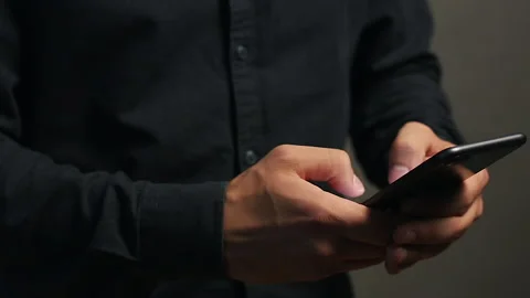 Handsome Business Man Using Smartphone for work Stock Footage 132917409