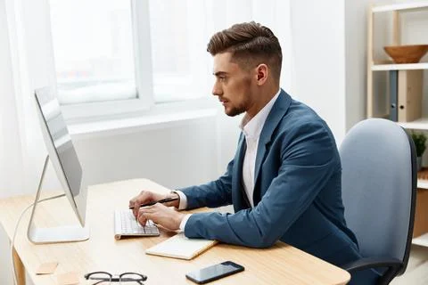 Handsome businessman computer desktop work self-confidence paper folder isolated Stock Photos