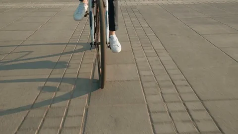 Handsome businessman cycling in the downtown - vacation footage Stock Footage