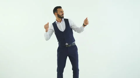 The handsome businessman dancing on the white background Stock Footage 100748243