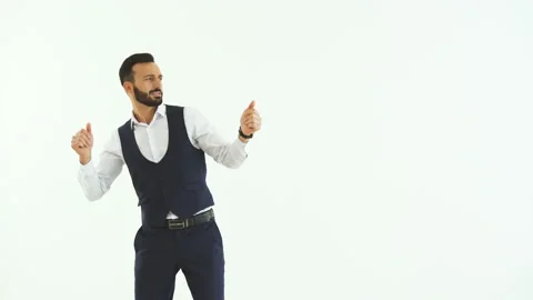The handsome businessman dancing on the white wall background Video stock 100751660