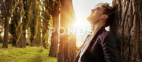 Handsome businessman enjoying the summer journey Stock Photos