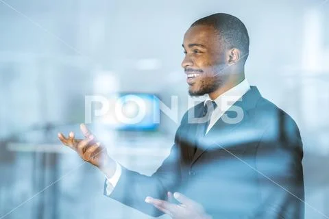 The handsome businessman gesture over the glass Stock Photos