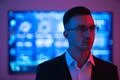 The handsome businessman in glasses on the screen background Photo