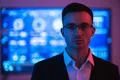 The handsome businessman in glasses on the screen background Photo