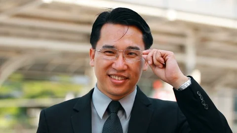 Handsome Businessman Smiling Video stock 87002656
