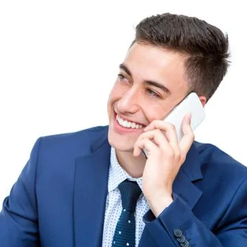 Handsome businessman talking on smart phone. Stock Photos