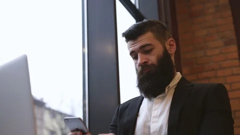 Handsome businessman working in the cafe during lunch Stock Footage 74007864