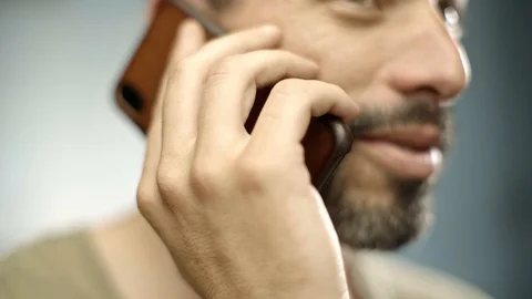 Handsome caucasian man texting and smiling in his kitchen. close up. Stock Footage 108273048