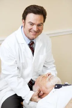 Handsome Chiropractor Working Foto stock
