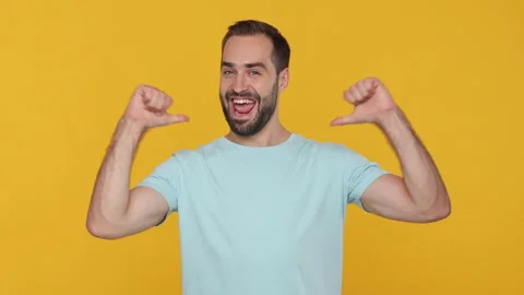 Handsome confident bearded young man 20s in basic casual blue t-shirt isolated 스톡 동영상 148283031