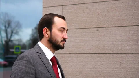 Handsome confident white man strolling through the city. Stock Footage 142590883