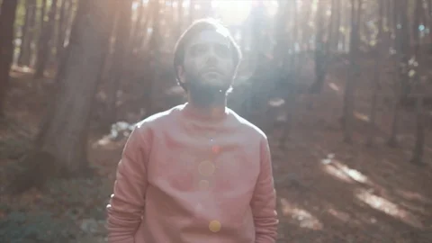 Handsome cool guy is relaxation in forest, autumn time. Freedom and yoga  Stock Footage 119040085