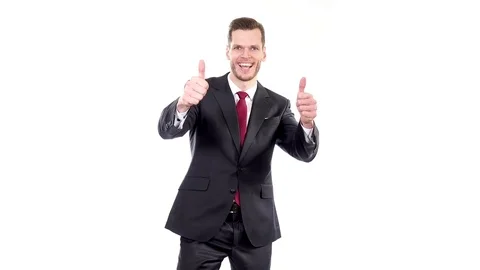 Handsome corporate manager gesturing thumbs up . Isolated on white background Stock Footage 84010405