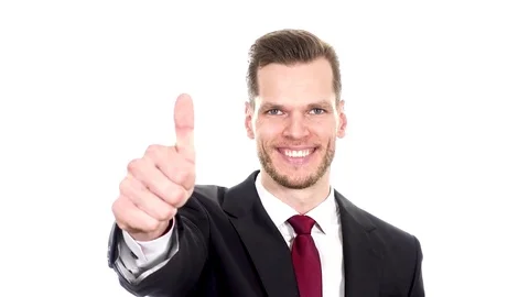 Handsome corporate manager gesturing thumbs up . Isolated on white background Stock Footage 84010534