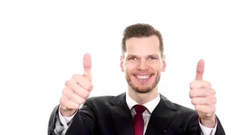 Handsome corporate manager gesturing thumbs up . Isolated on white background Stock Footage 84010548