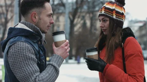 Handsome couple of thier first date. Young male and woman talking and drinking Stock Footage 59952477