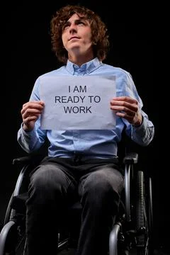 Handsome disabled invalid man does not give up despite disability Stock Photos