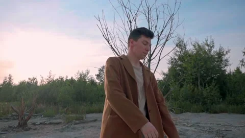 Handsome dreary man looking at camera,  slow motion Stock Footage 138260168