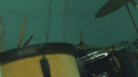 Handsome drummer preparing hi-hat on drums in studio. Video stock 83885818